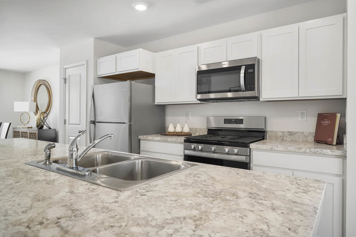 3743 Bailey Road Yorkville, IL 60560 - Photo 8 of 20 a kitchen with stainless steel appliances granite countertop a sink and a stove
