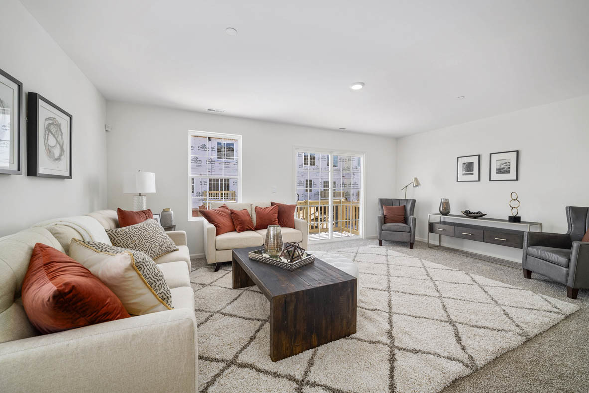 3743 Bailey Road Yorkville, IL 60560 - Photo 10 of 20 a living room with furniture and a rug