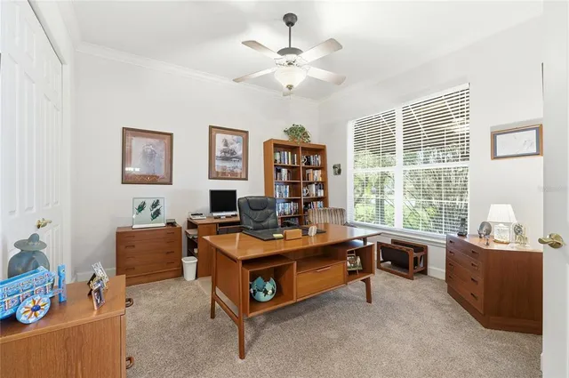a view of a workspace with furniture