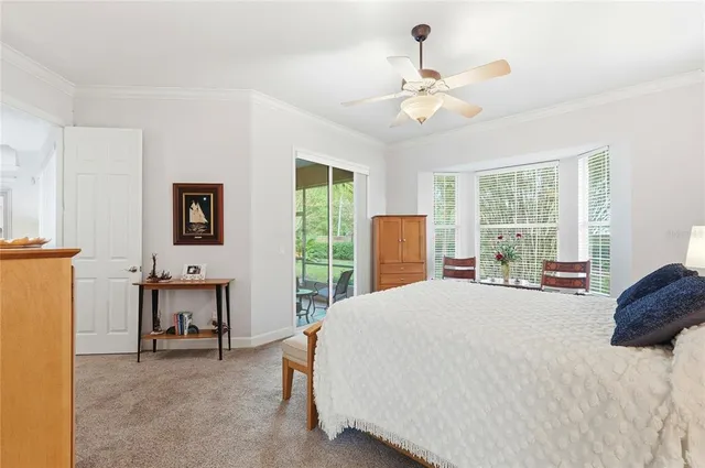 a bedroom with a bed and dresser