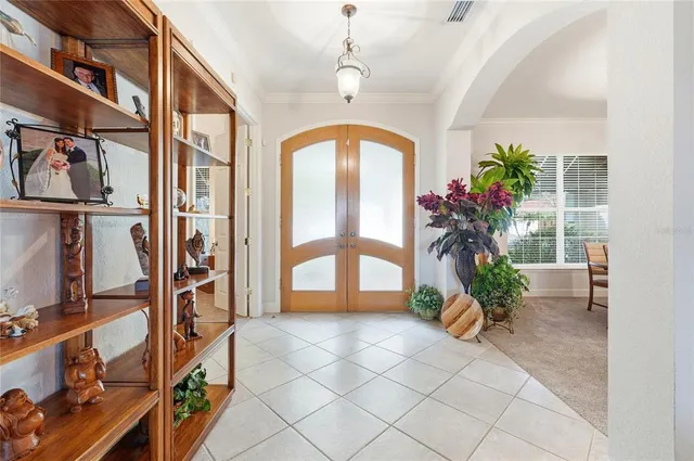 a view of a entryway with flower pots