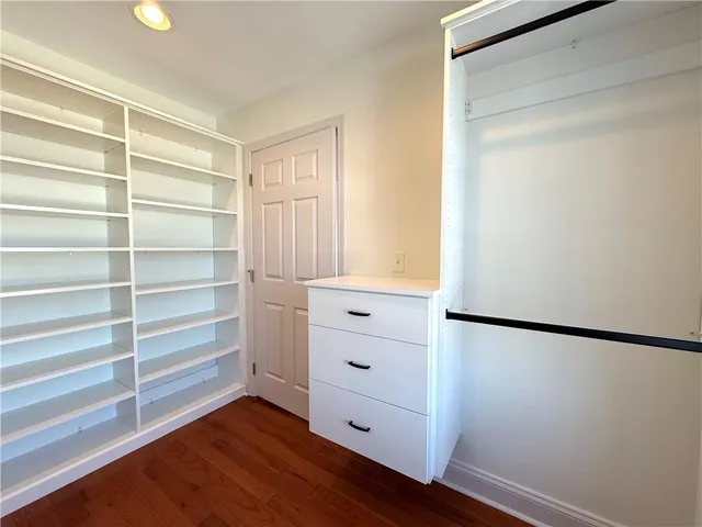 a picture of a bathroom with a shower