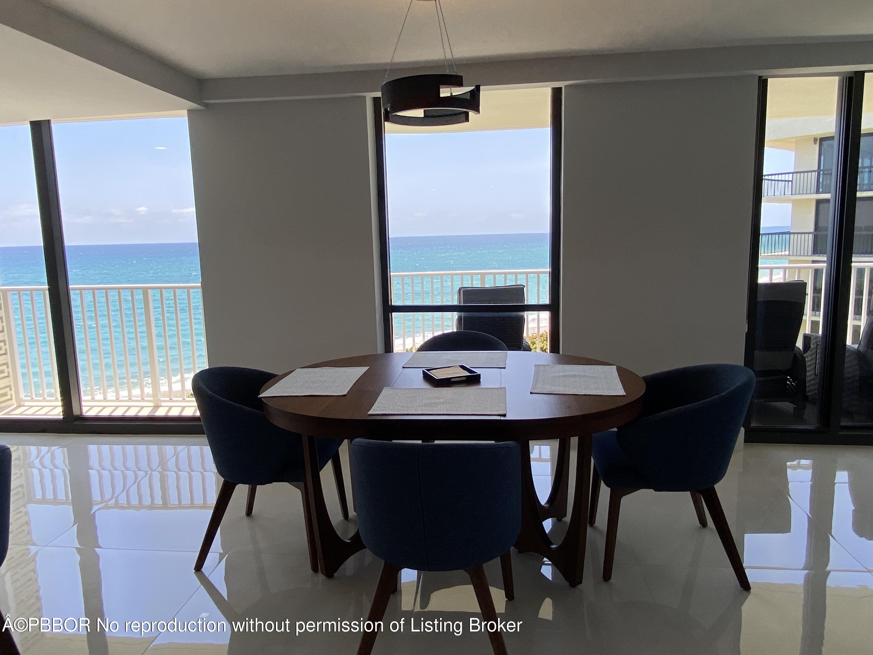 3360 South Ocean Boulevard, Unit 4FII Palm Beach, FL 33480 - Photo 13 of 32 a view of a dining room with furniture and window