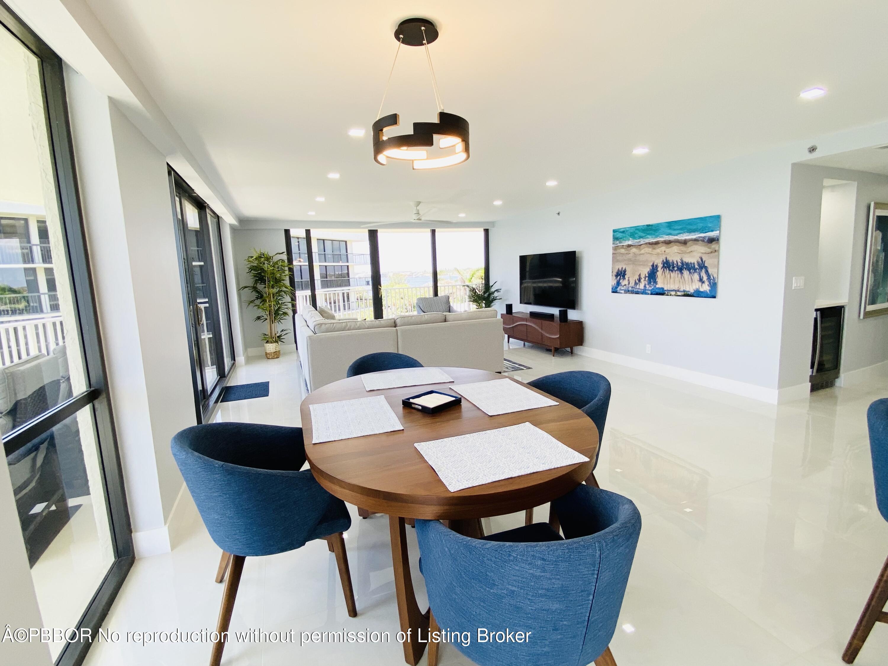 3360 South Ocean Boulevard, Unit 4FII Palm Beach, FL 33480 - Photo 16 of 32 a living room with furniture and a flat screen tv