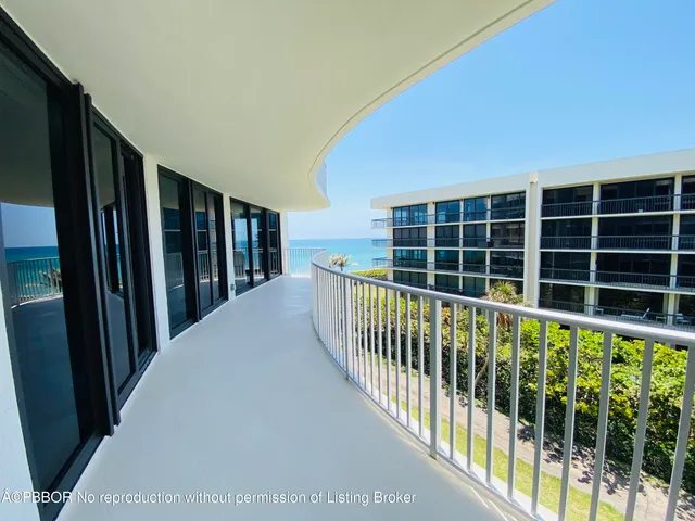 a view of balcony with furniture