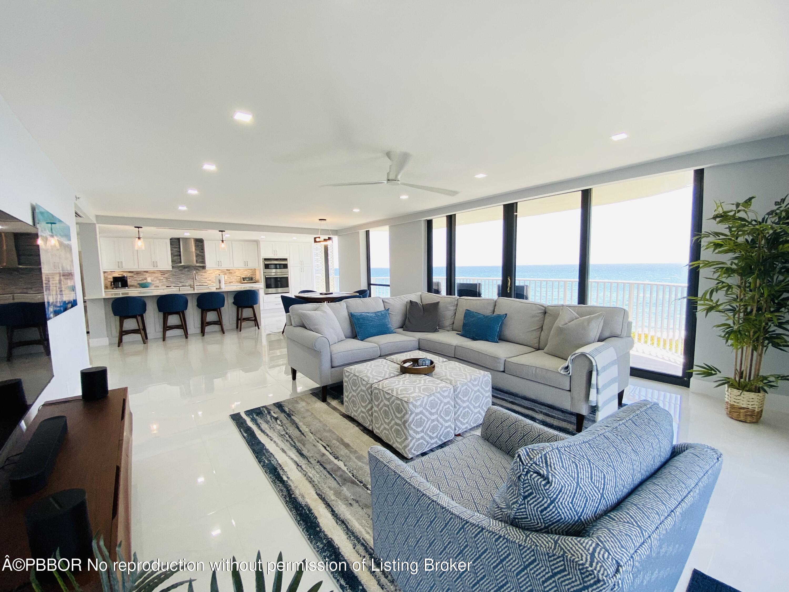 3360 South Ocean Boulevard, Unit 4FII Palm Beach, FL 33480 - Photo 4 of 32 a living room with furniture kitchen view and a large window