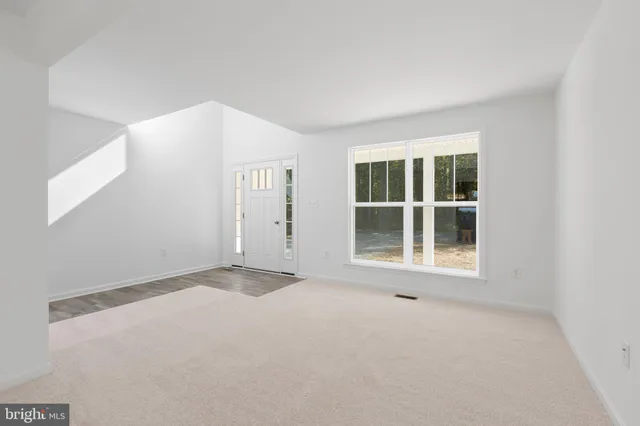 a view of a room with windows