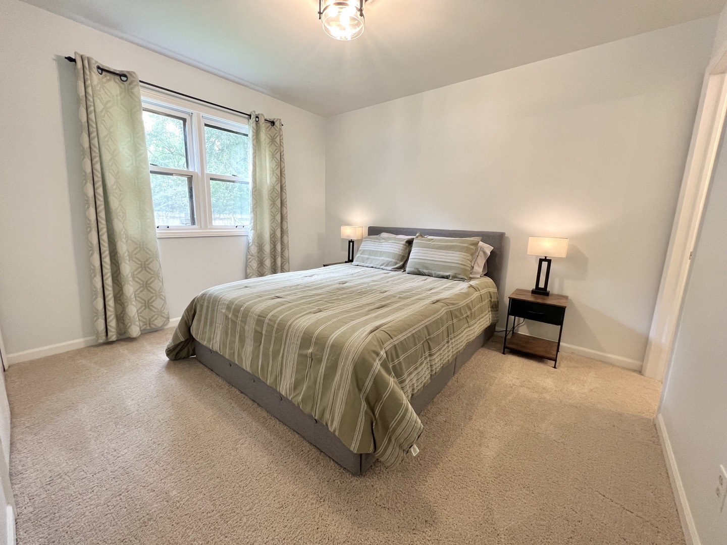 1201 Clark Street Rantoul, IL 61866 - Photo 16 of 24 a bedroom with a bed and a window