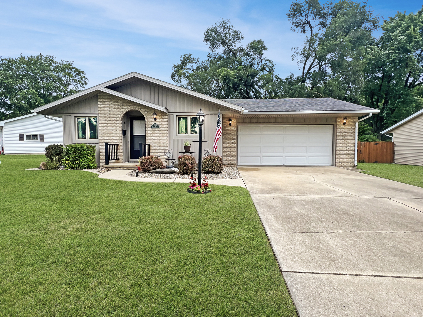 1201 Clark Street Rantoul, IL 61866 - Photo 2 of 24 a front view of house with yard and trees