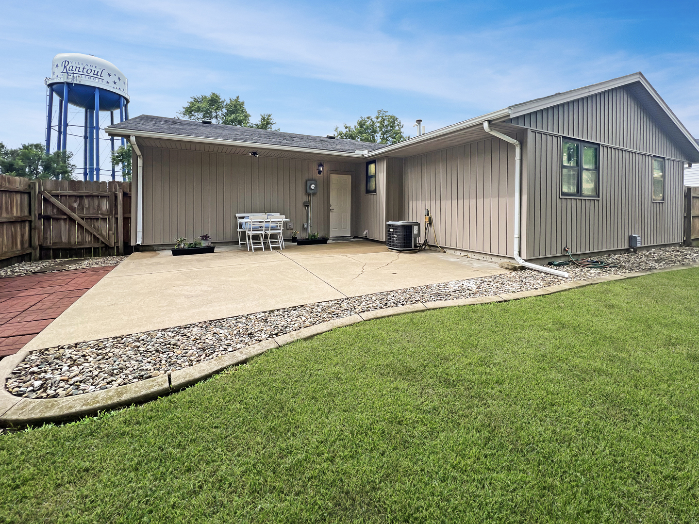 1201 Clark Street Rantoul, IL 61866 - Photo 23 of 24 a front view of a house with garden