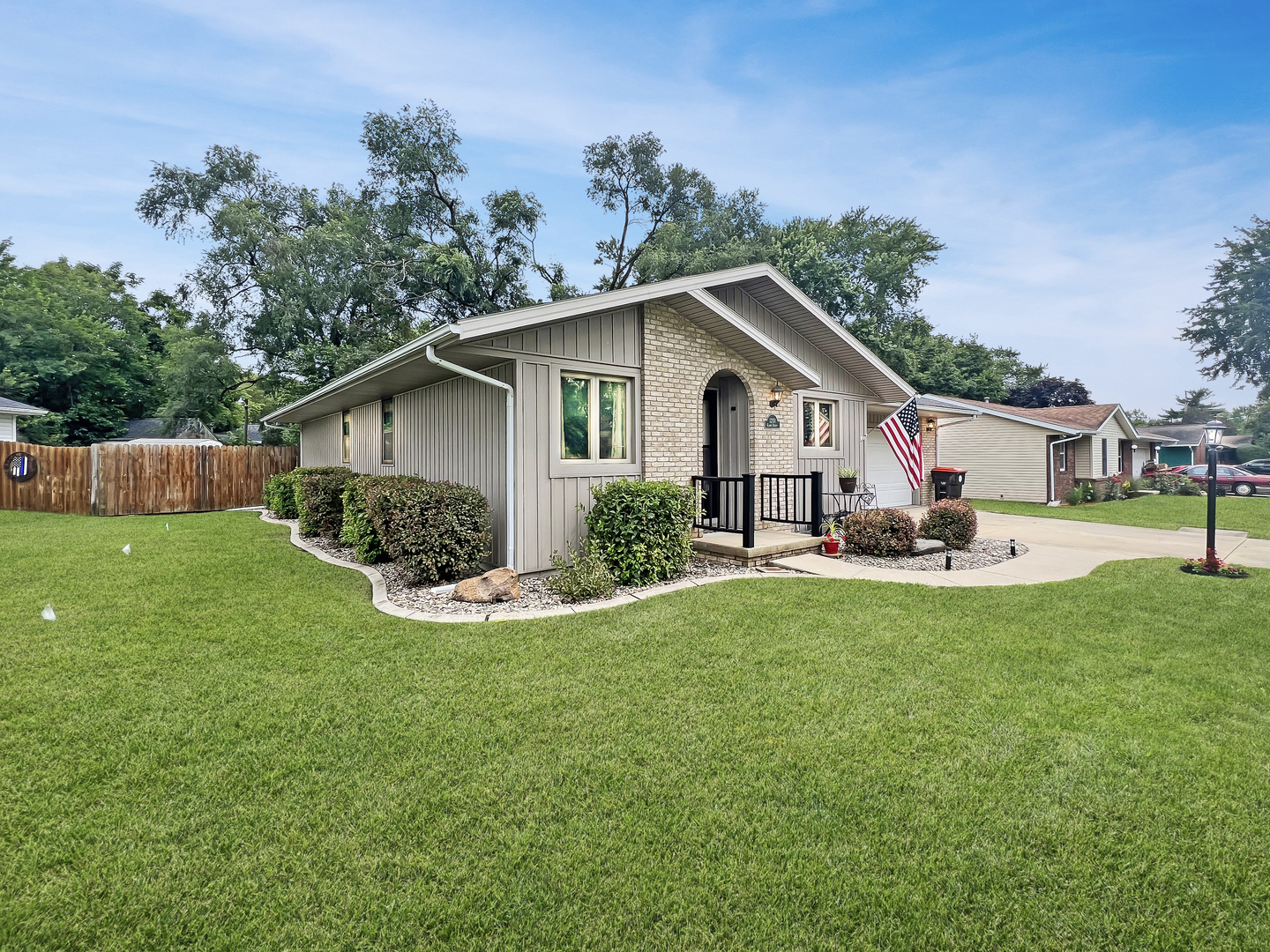 1201 Clark Street Rantoul, IL 61866 - Photo 3 of 24 a front view of house with yard and outdoor seating