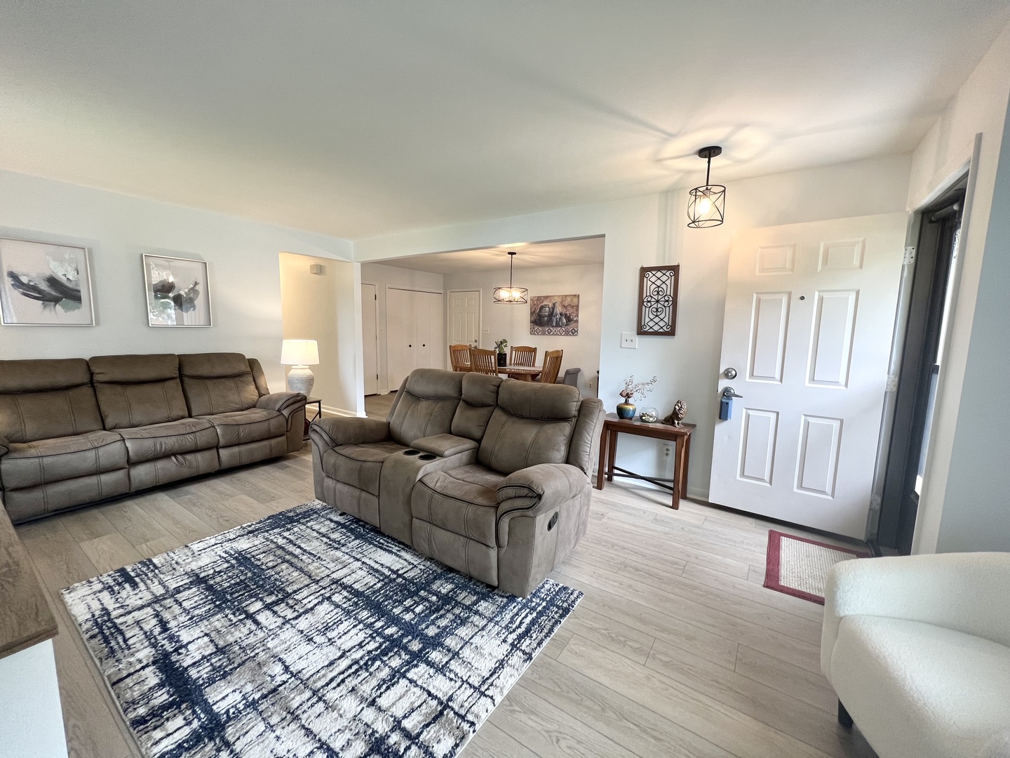 1201 Clark Street Rantoul, IL 61866 - Photo 4 of 24 a living room with furniture and a rug