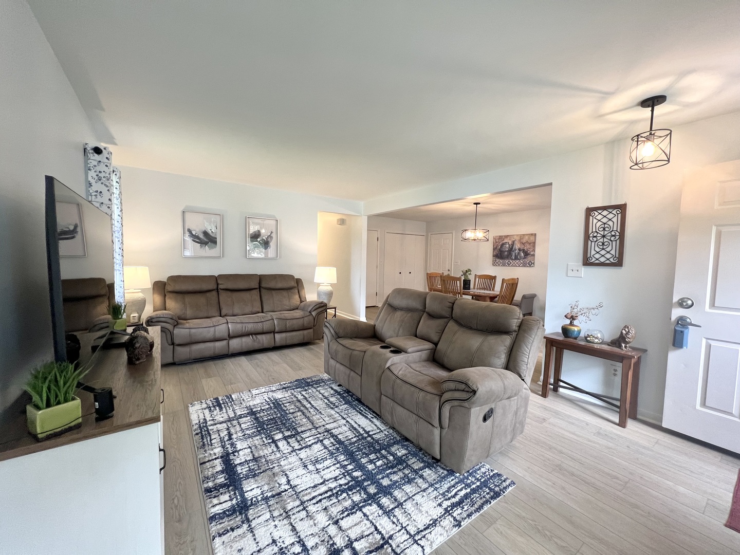 1201 Clark Street Rantoul, IL 61866 - Photo 5 of 24 a living room with furniture and a flat screen tv