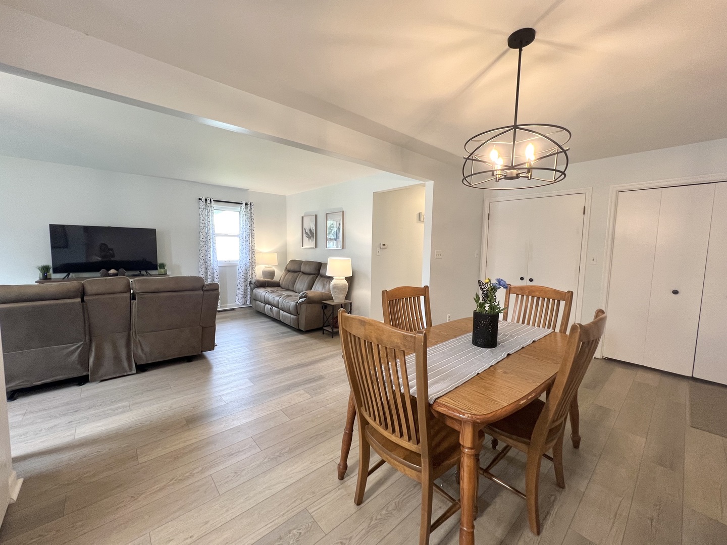 1201 Clark Street Rantoul, IL 61866 - Photo 8 of 24 a view of a dining room with furniture window and wooden floor