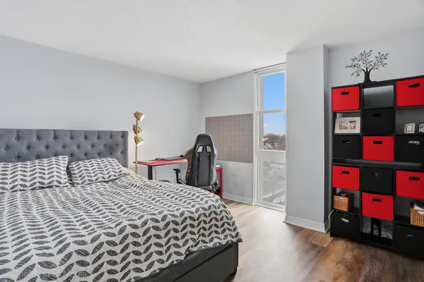 a bedroom with a bed and a closet