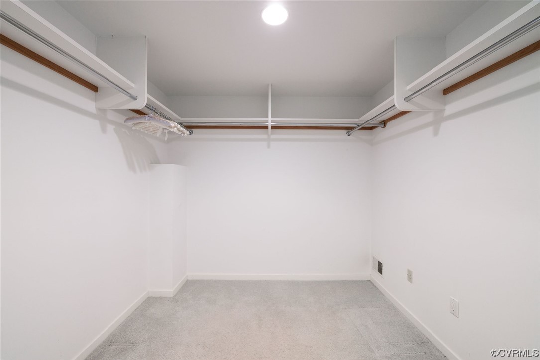 2831 West Brigstock Road Midlothian, VA 23113 - Photo 38 of 49 a view of an empty walk in closet