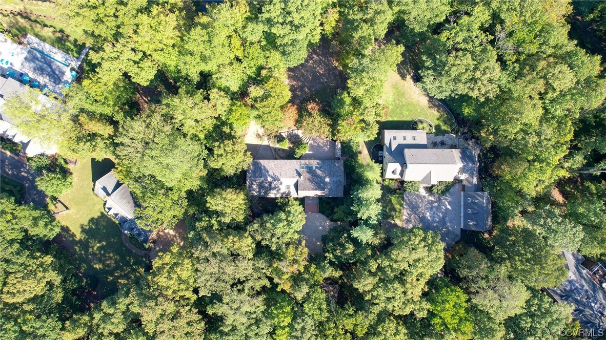 2831 West Brigstock Road Midlothian, VA 23113 - Photo 45 of 49 an aerial view of a house with a yard and garden