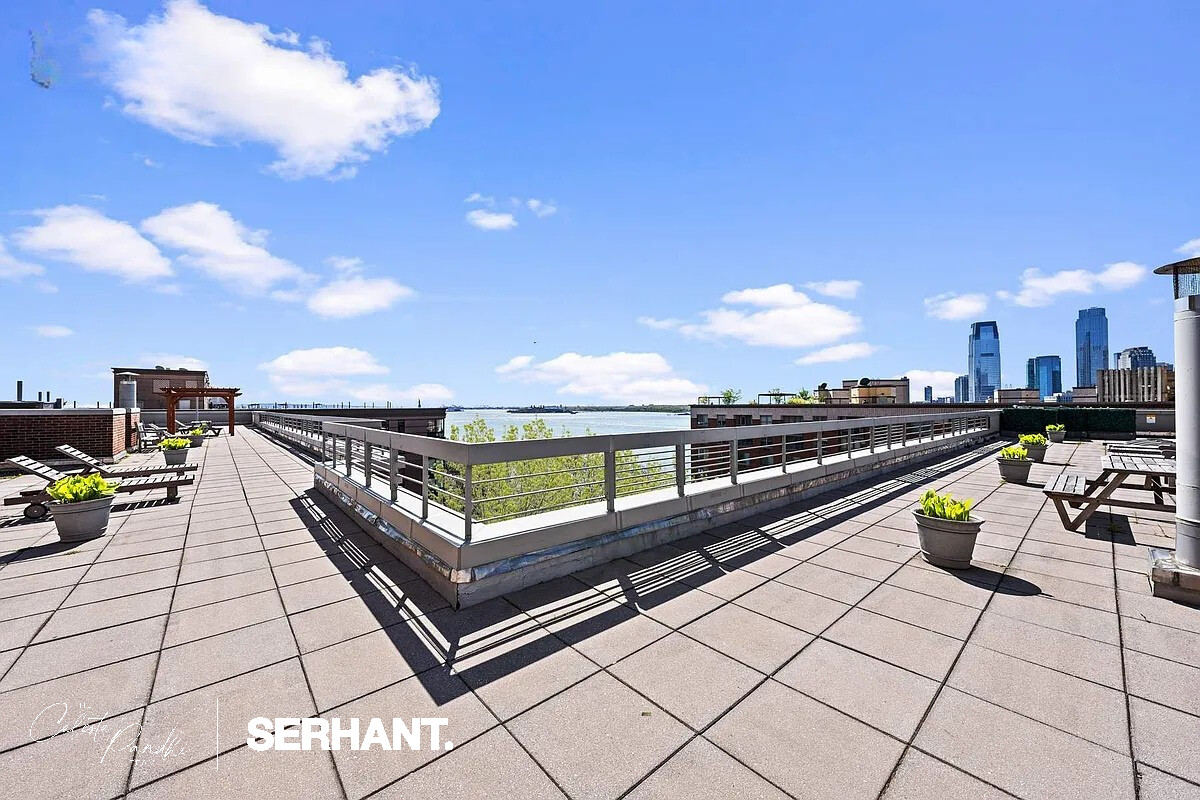 2 South End Avenue, Unit 6J Manhattan, NY 10280 - Photo 14 of 19 a view of a terrace with chairs