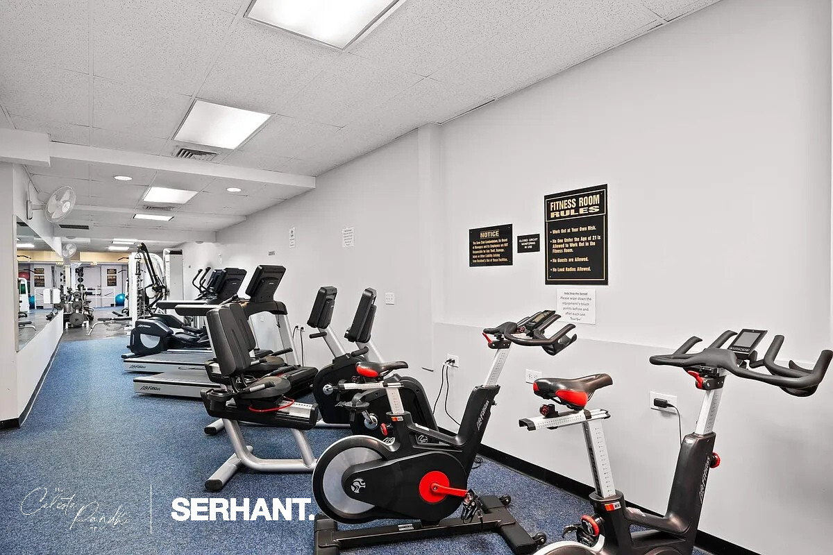 2 South End Avenue, Unit 6J Manhattan, NY 10280 - Photo 18 of 19 a view of a room with gym equipment