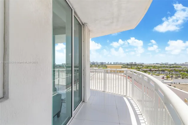 a view of a balcony with an ocean view