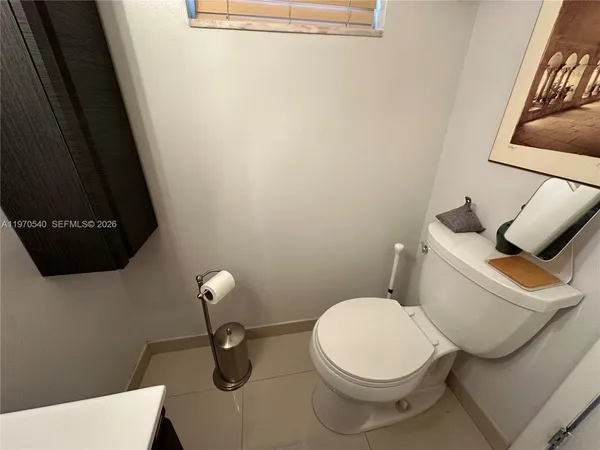 a workspace with furniture and a window