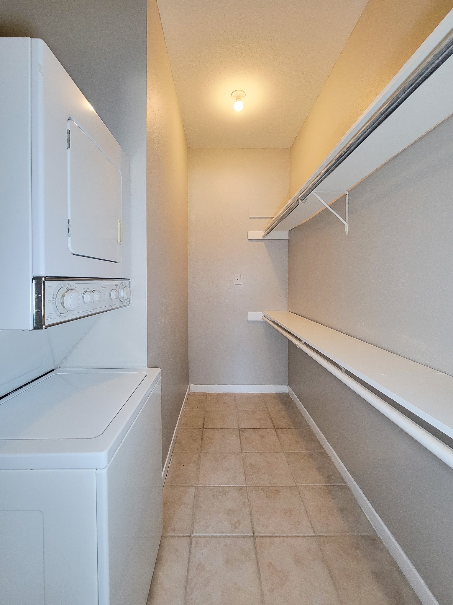 4041 Drake Street, Unit 116 Houston, TX 77005 - Photo 19 of 27 a view of walk in closet with empty racks