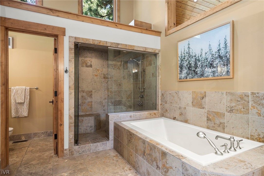 623 Tyner Way Incline Village, NV 89451 - Photo 20 of 35 a bathroom with a bathtub and shower