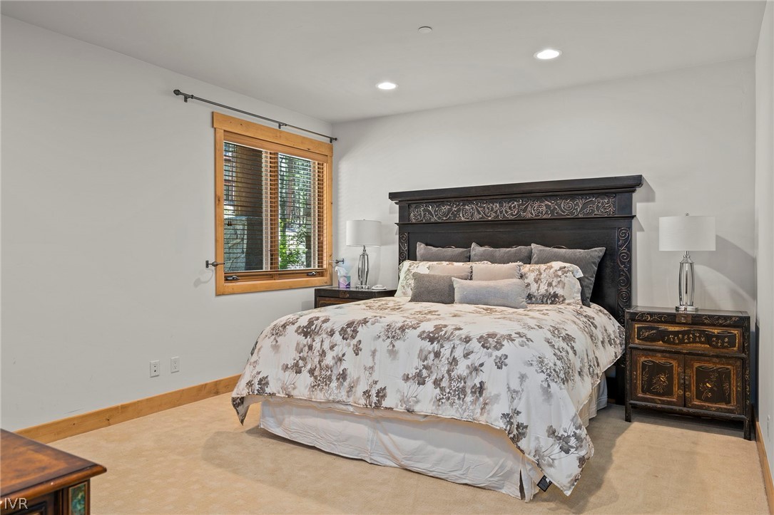 623 Tyner Way Incline Village, NV 89451 - Photo 30 of 35 a bedroom with a bed and a tv