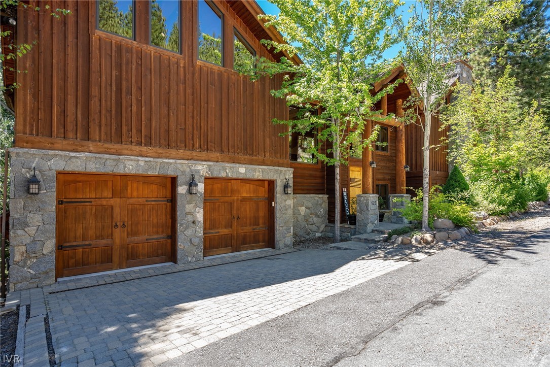 623 Tyner Way Incline Village, NV 89451 - Photo 3 of 35 a front view of a house with a yard