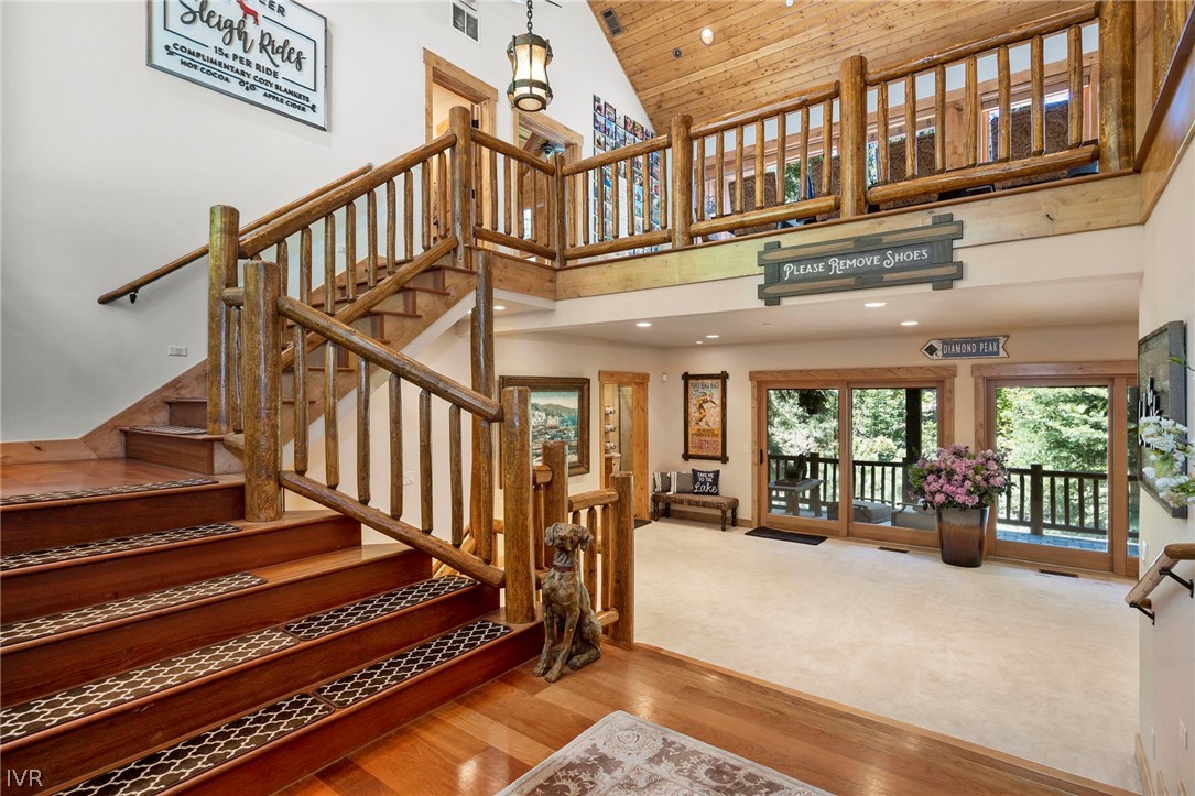 623 Tyner Way Incline Village, NV 89451 - Photo 4 of 35 a view of staircase with a large window and a chandelier