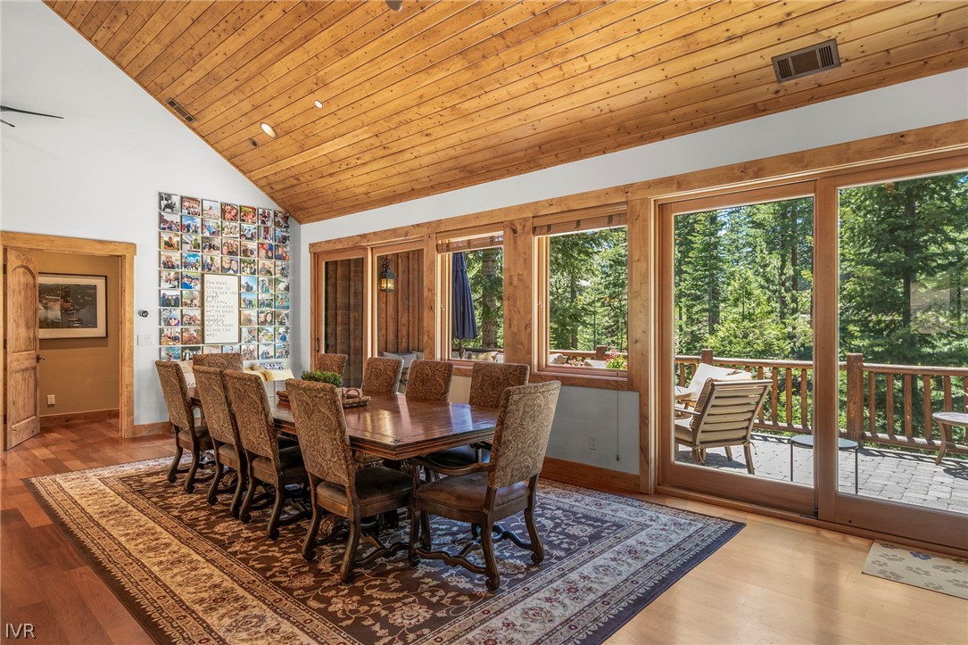 623 Tyner Way Incline Village, NV 89451 - Photo 7 of 35 a view of a dining room with furniture window and wooden floor
