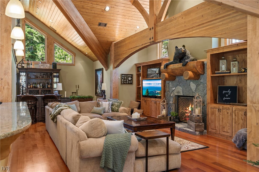 623 Tyner Way Incline Village, NV 89451 - Photo 8 of 35 a living room with furniture a fireplace and a large window