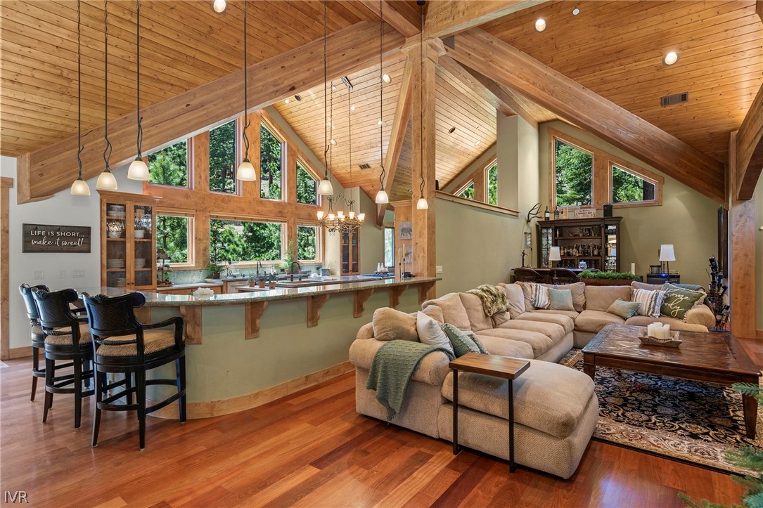 623 Tyner Way Incline Village, NV 89451 - Photo 10 of 35 a living room with furniture a large window and wooden floor