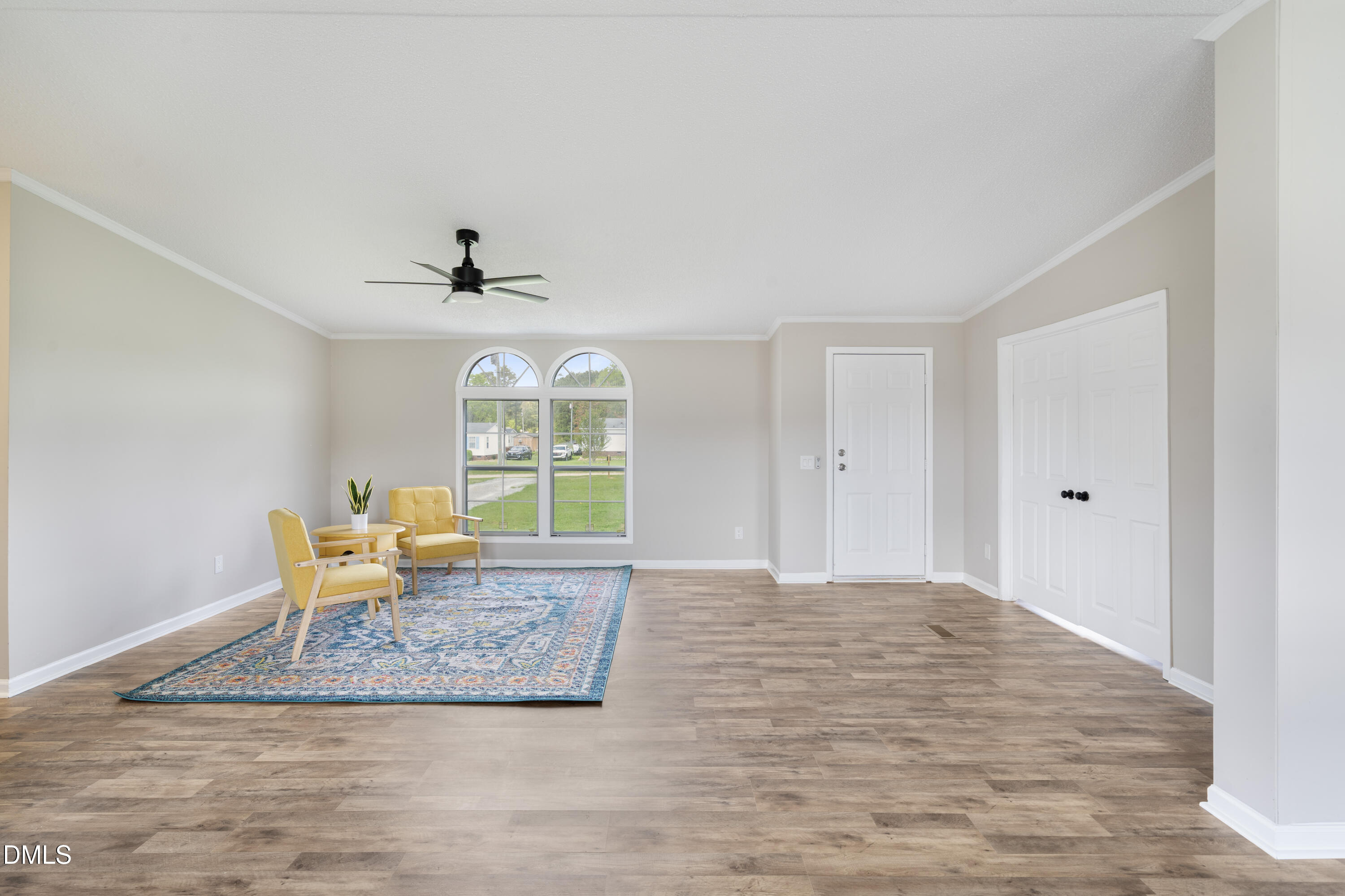 2048 Town Crier Road Kinston, NC 28504 - Photo 11 of 48 a large bedroom with a bed and a window