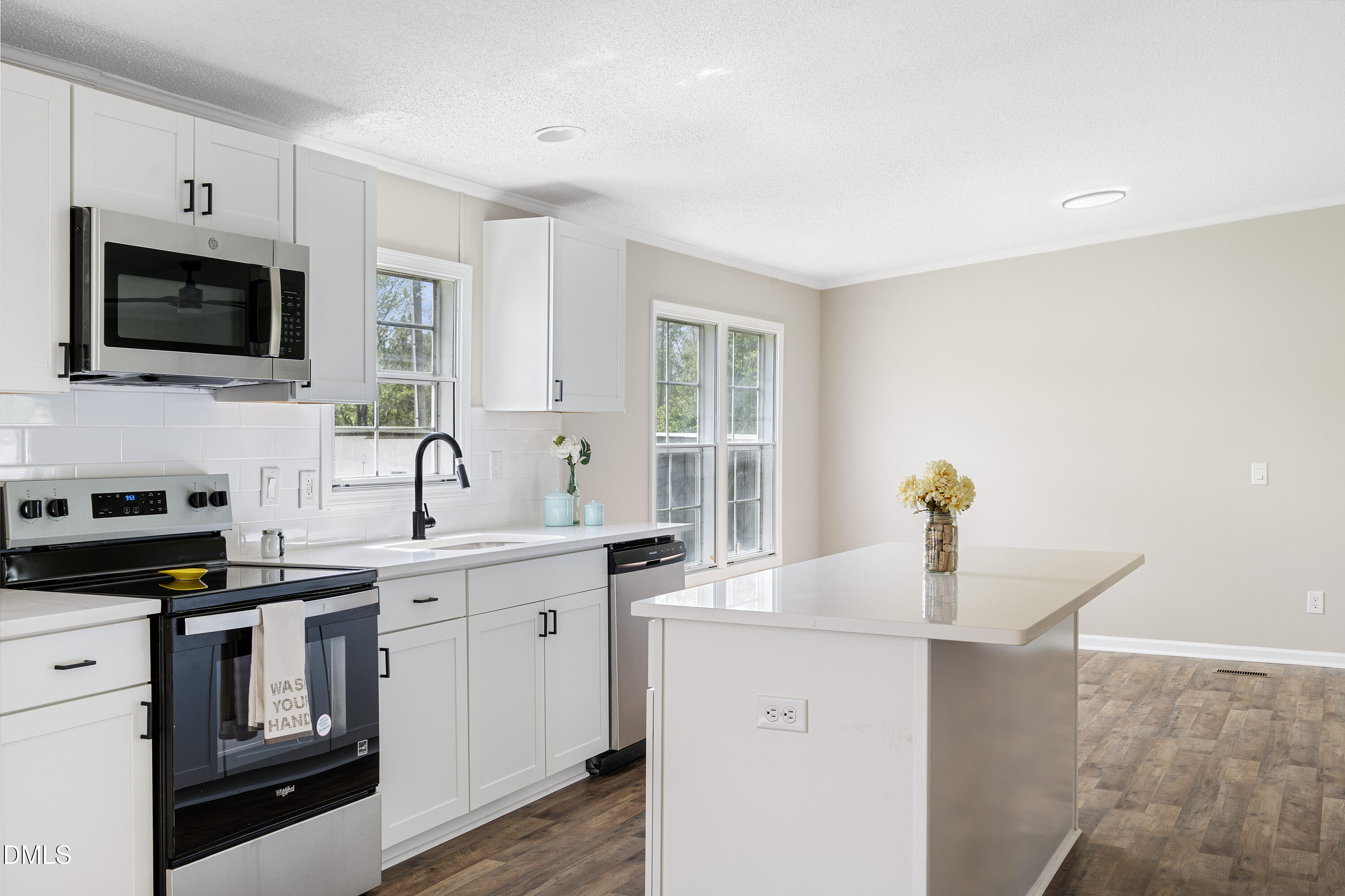 2048 Town Crier Road Kinston, NC 28504 - Photo 15 of 48 a kitchen with a sink stove top oven and microwave