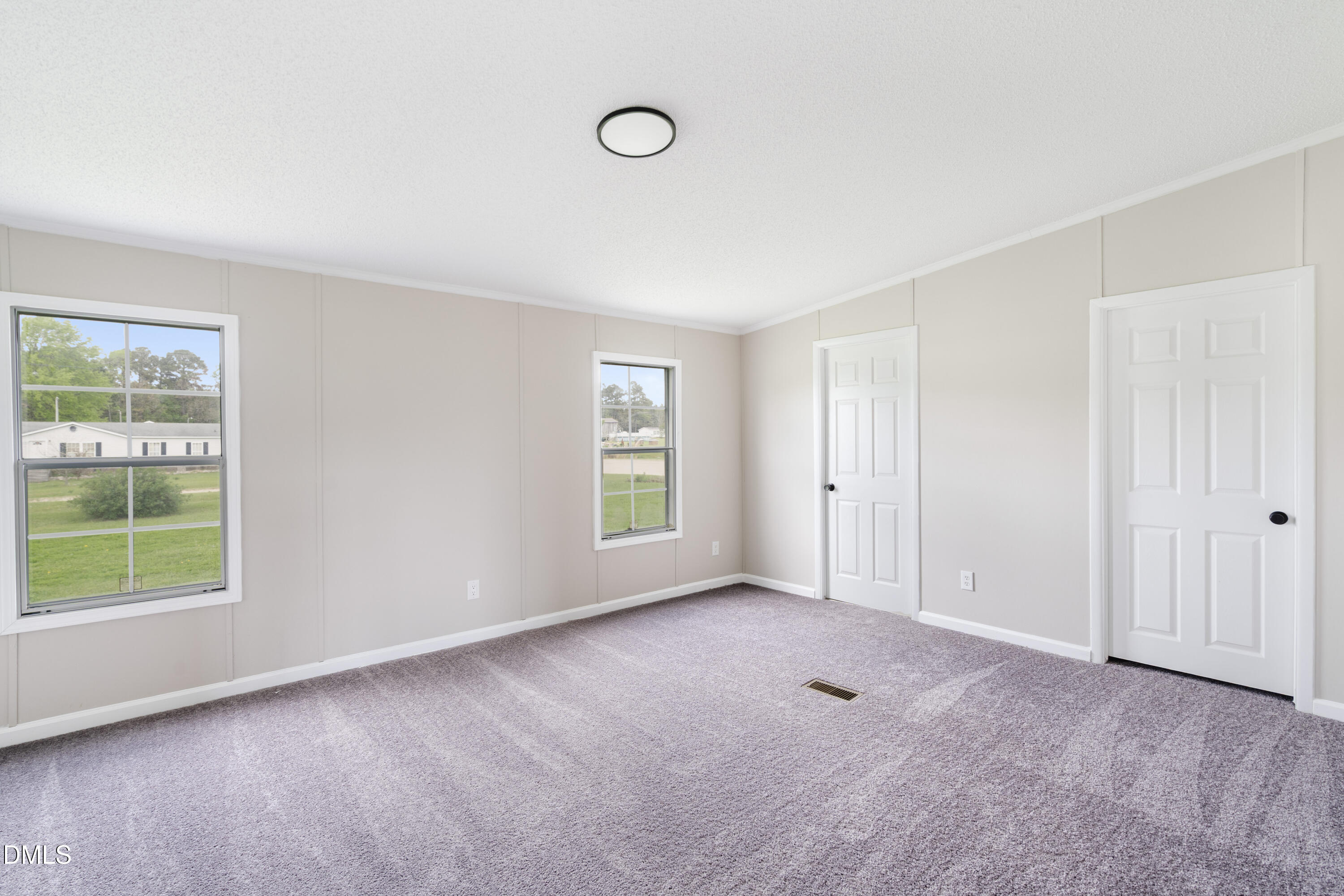 2048 Town Crier Road Kinston, NC 28504 - Photo 25 of 48 a view of an empty room with a window