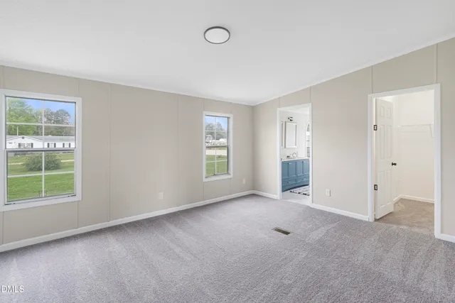 an empty room with windows