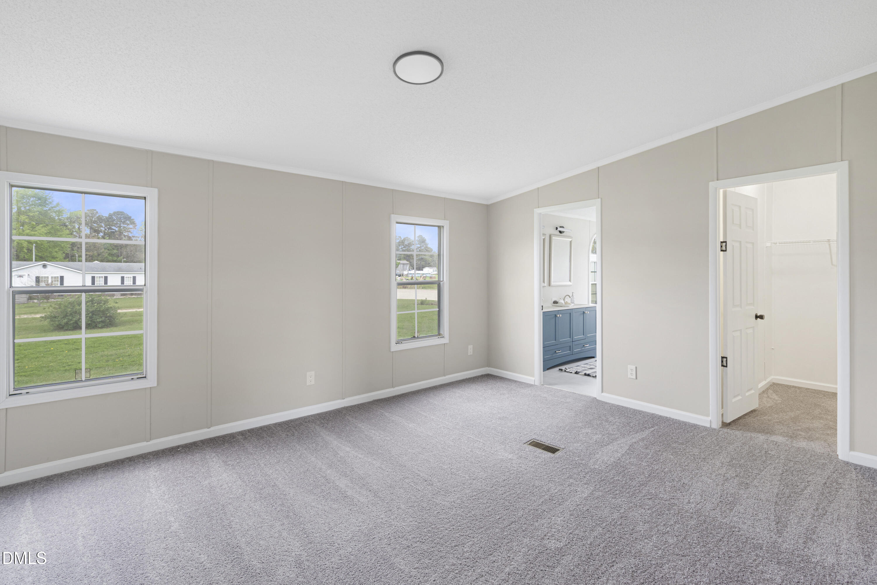 2048 Town Crier Road Kinston, NC 28504 - Photo 26 of 48 an empty room with windows