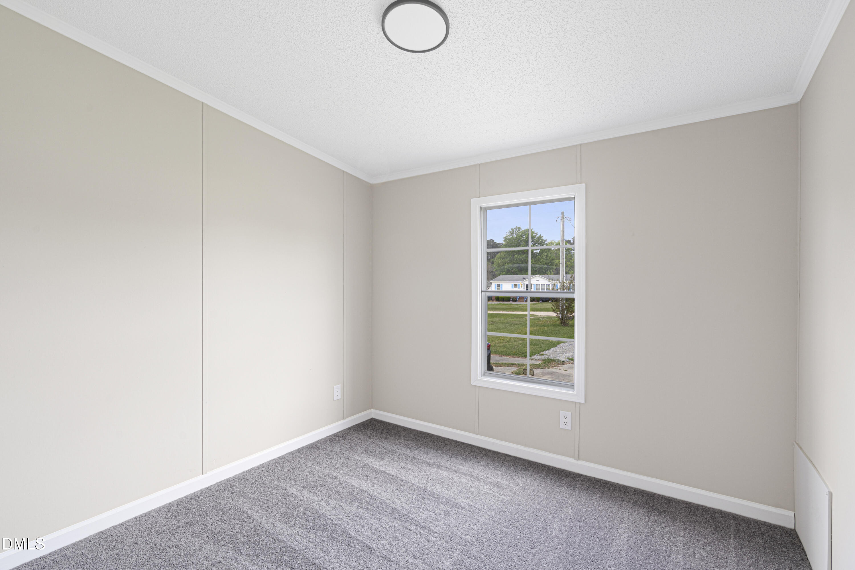 2048 Town Crier Road Kinston, NC 28504 - Photo 36 of 48 an empty room with windows