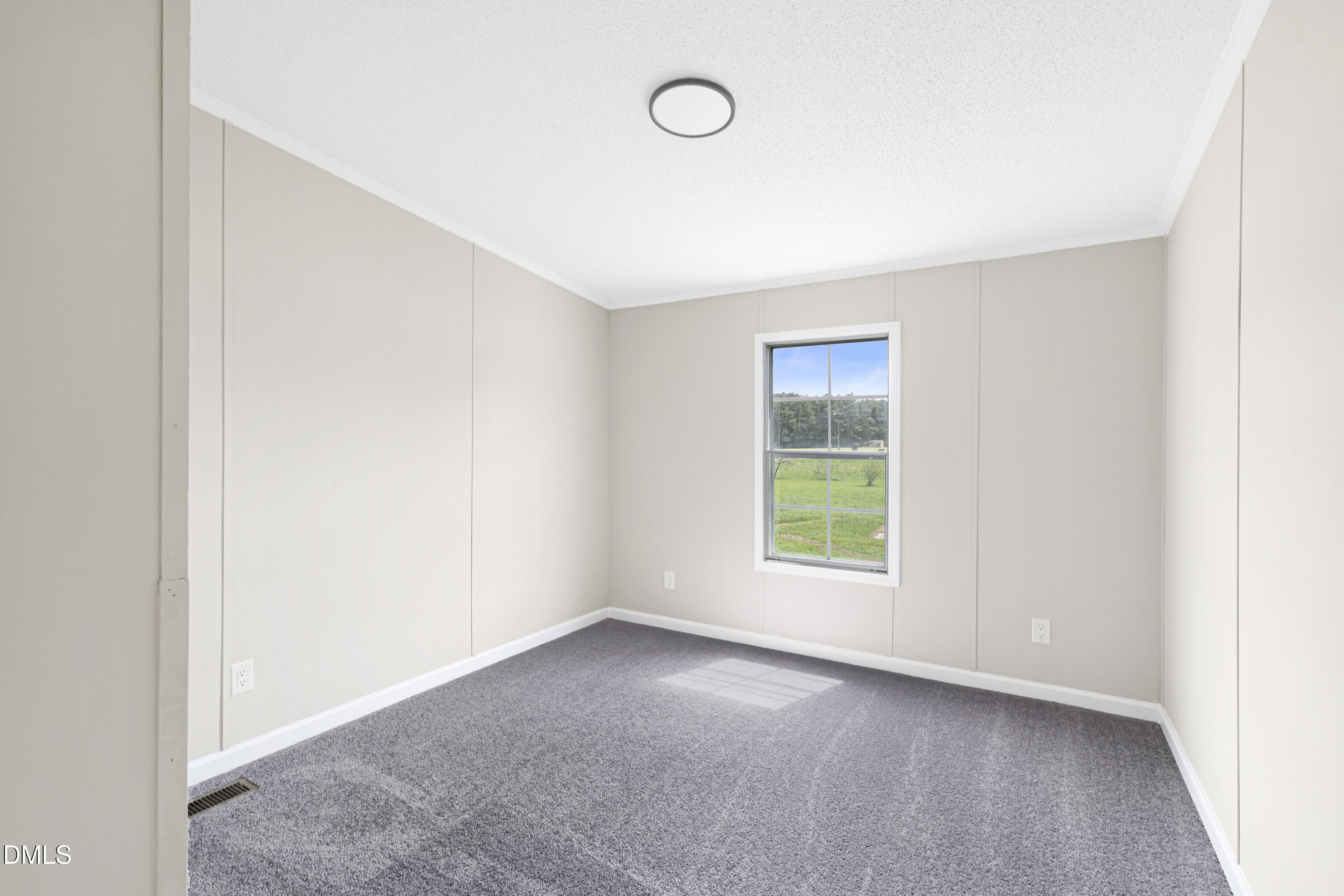 2048 Town Crier Road Kinston, NC 28504 - Photo 37 of 48 a view of a room that has a window in it
