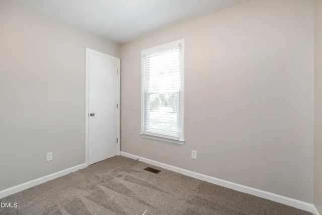 an empty room with a window