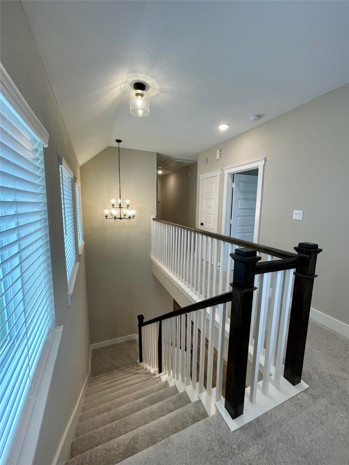 18607 Courteous Way Cypress, TX 77433 - Photo 18 of 37 a view of staircase with wooden floor and fan