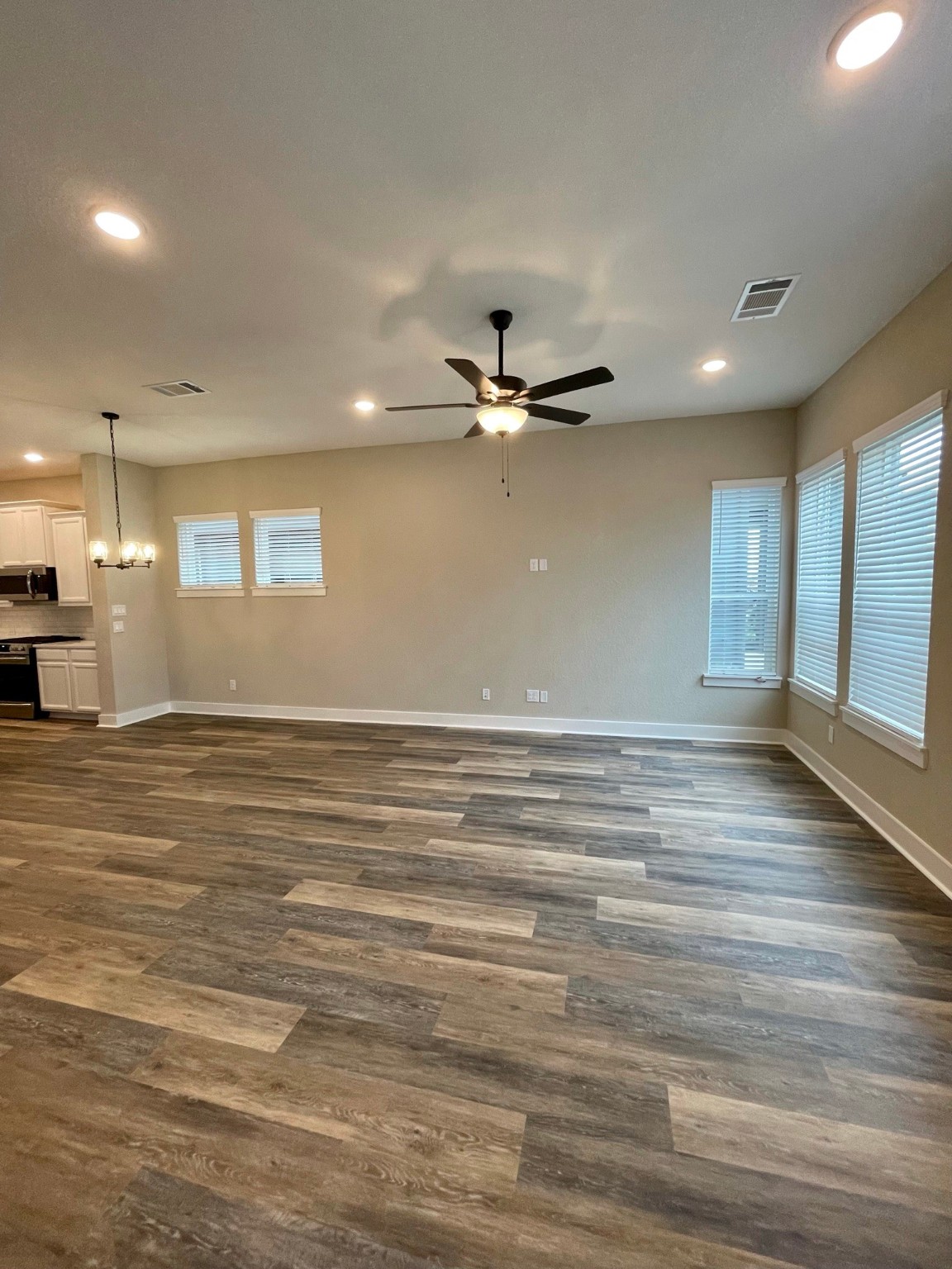 18607 Courteous Way Cypress, TX 77433 - Photo 6 of 37 a view of a room with a ceiling fan