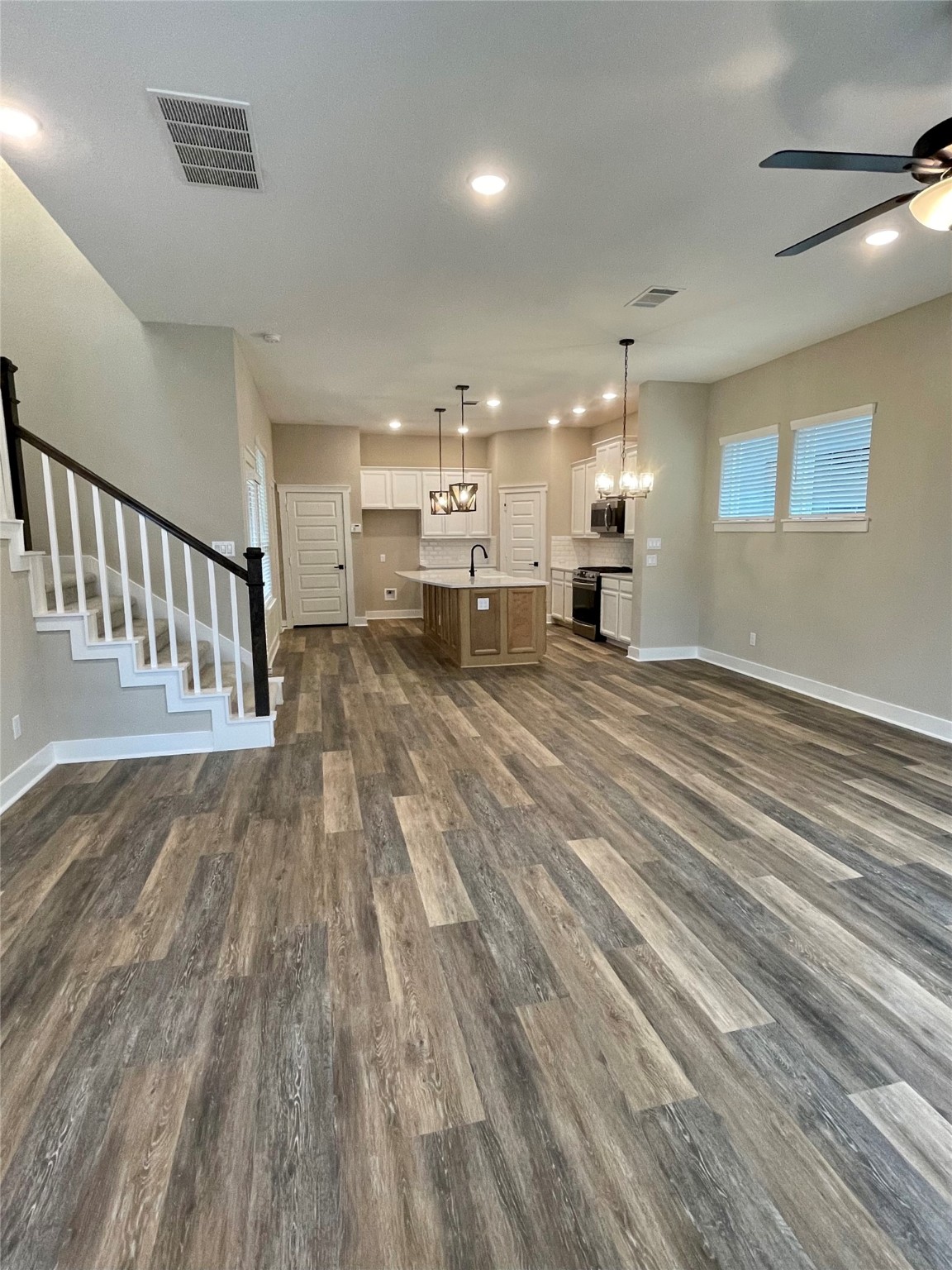 18607 Courteous Way Cypress, TX 77433 - Photo 9 of 37 a view of a room with wooden floor