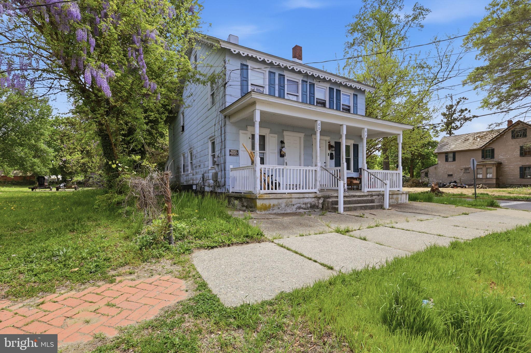 60 Walnut Street Salem, NJ 08079 - Photo 2 of 25 Charming two-story home with porch.