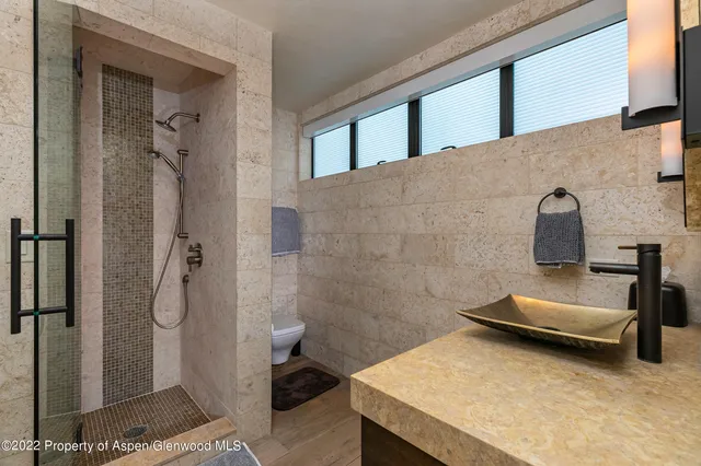 a bathroom with a sink and toilet