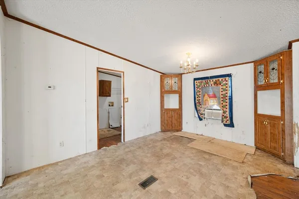 a view of livingroom with furniture and window