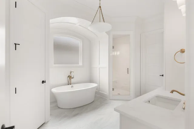 a bathroom with a sink and a bathtub