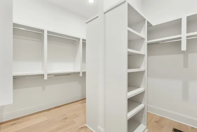 a view of an empty walk in closet
