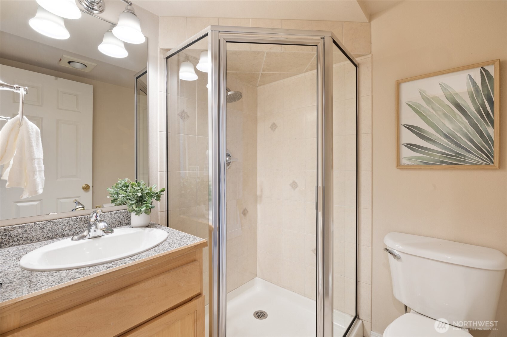 1512 Northwest 57th Street, Unit B Seattle, WA 98107 - Photo 11 of 27 a bathroom with a sink toilet and shower